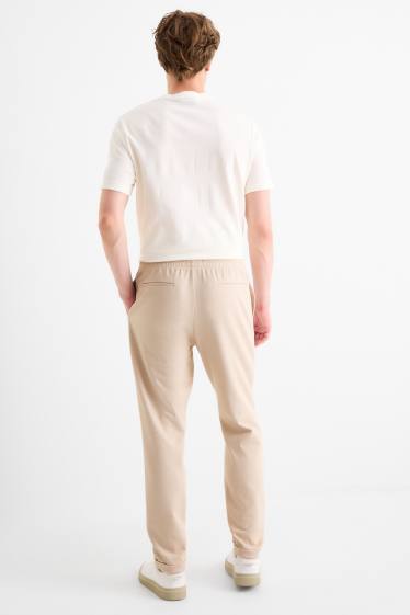 Bărbați - Pantaloni de trening - bej deschis