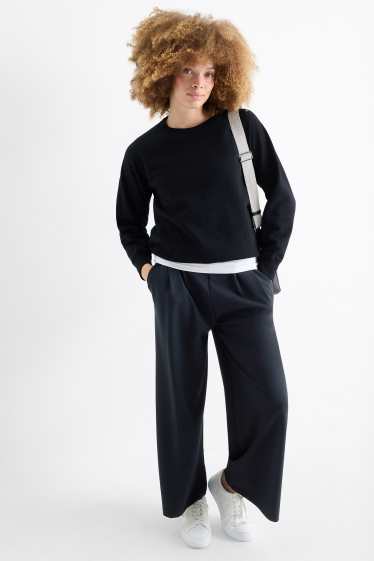 Femei - Pantaloni din jerseu - talie medie - palazzo - negru