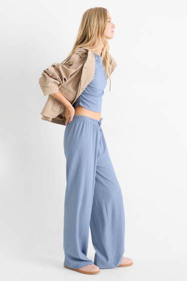 Women - Jersey trousers - mid-rise waist - wide leg - textured - blue