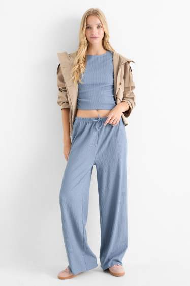 Women - Jersey trousers - mid-rise waist - wide leg - textured - blue