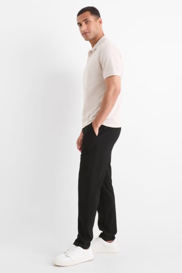 Men - Chinos - tapered fit - black