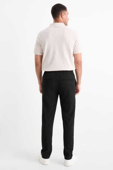 Men - Chinos - tapered fit - black