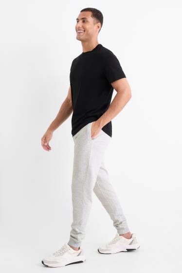 Bărbați - Pantaloni de trening - gri deschis melanj