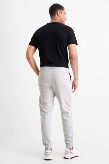 Bărbați - Pantaloni de trening - gri deschis melanj