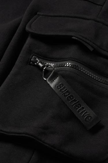 Bărbați - Pantaloni de trening cargo - negru