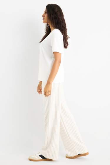 Femei - Pantaloni din jerseu - talie medie - straight fit - cu dungi - alb-crem