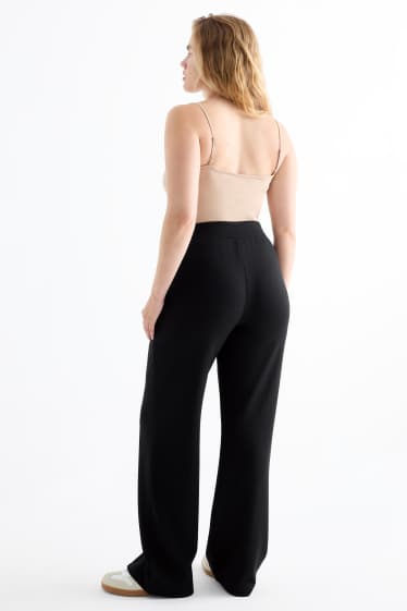 Femei - Pantaloni din jerseu - talie medie - straight fit - negru