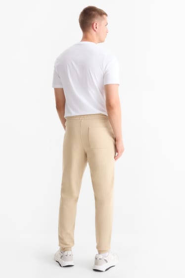 Bărbați - Pantaloni de trening - bej