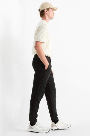 Bărbați - Pantaloni de trening - negru