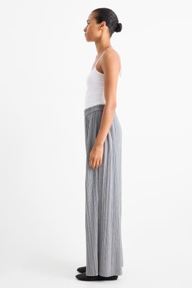 Women - Plissé trousers - high-rise waist - wide leg - gray