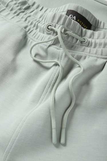 Femei - Pantaloni funcționali - verde deschis