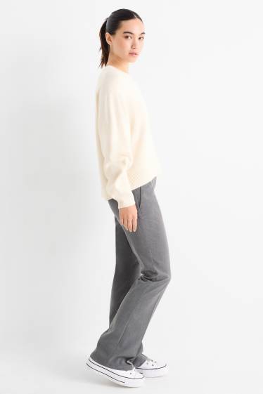 Femei - Pantaloni de stofă - talie medie - evazați - gri închis