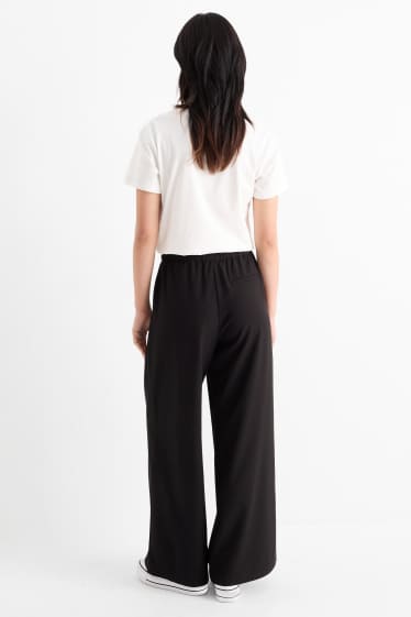 Femei - Pantaloni de stofă - talie medie - wide leg - negru