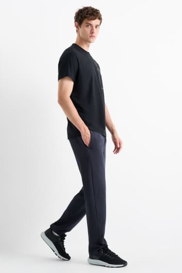 Bărbați - Pantaloni de trening funcționali - albastru închis