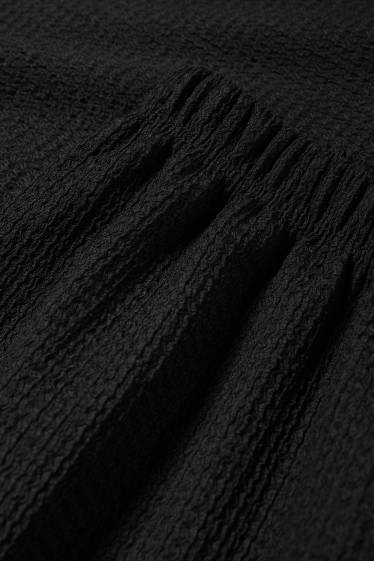 Women - Jersey trousers - mid-rise waist - wide leg - textured - black