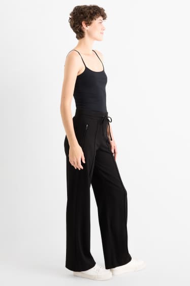 Femei - Pantaloni din jerseu - talie medie - straight fit - negru
