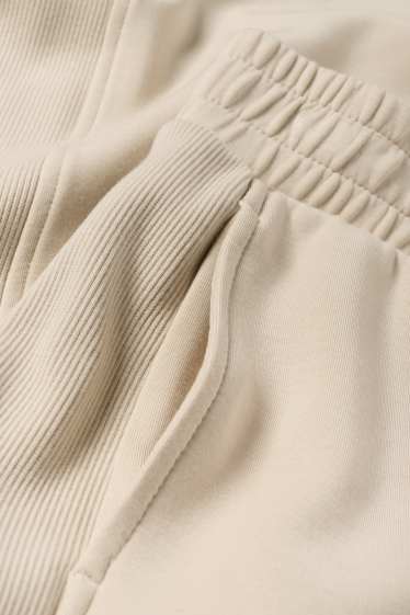 Femei - Pantaloni de sport - bej deschis