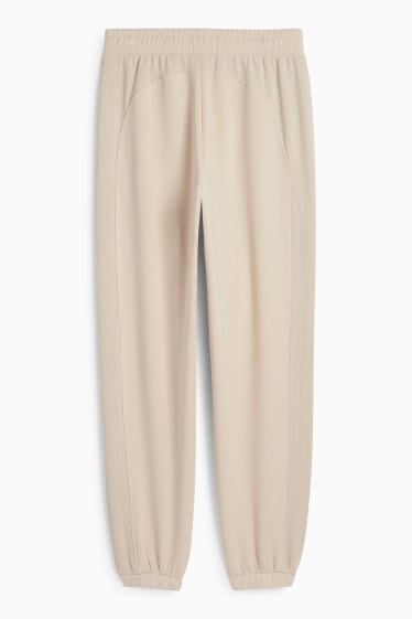 Femei - Pantaloni de sport - bej deschis