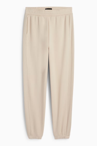 Femei - Pantaloni de sport - bej deschis