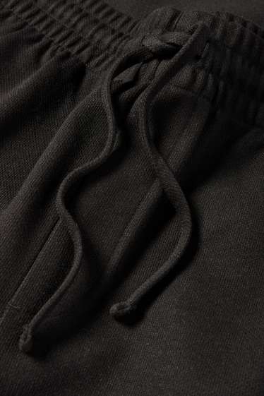 Bărbați - Pantaloni de trening - negru