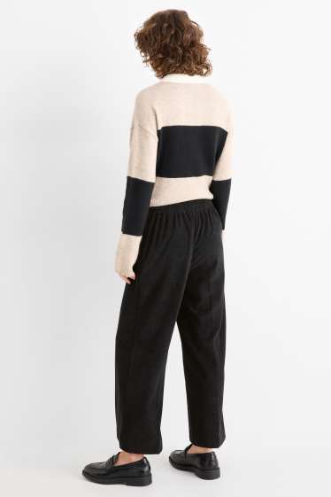 Femei - Pantaloni din catifea reiată - talie medie - wide leg - negru