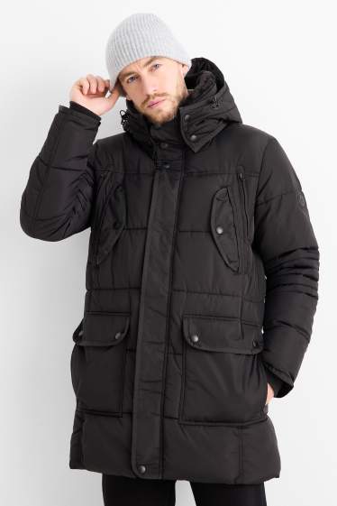 Bărbați - Parka matlasată cu glugă și aplicații din blană artificială - rezistentă la apă - negru