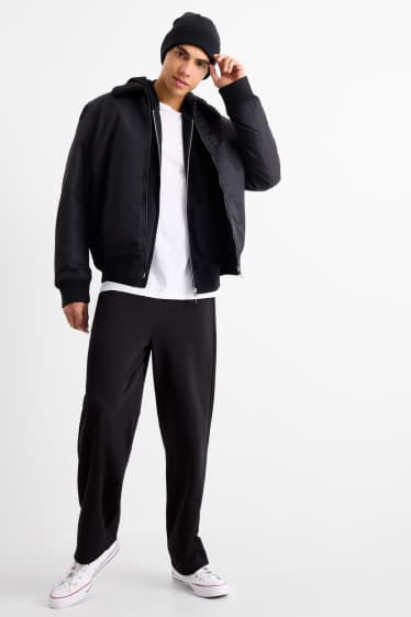 Bărbați - Pantaloni de trening - negru