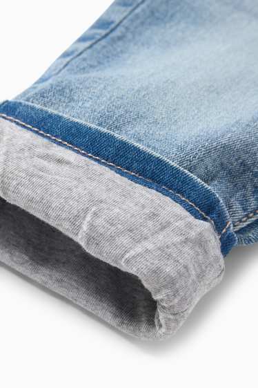 Bebeluși - fete - Floricele - jeans bebeluși - jeans termoizolanți - denim-albastru deschis