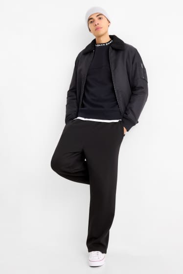 Bărbați - Pantaloni de trening - negru