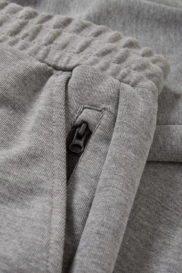 Bărbați - Pantaloni de trening - gri deschis melanj