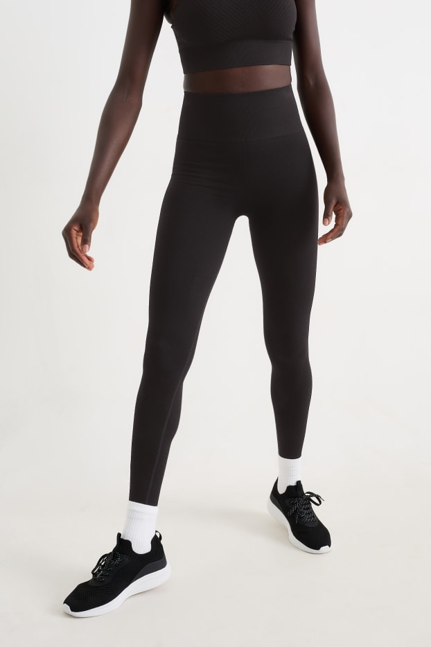 Femei - Colanți sport - protecție UV - negru