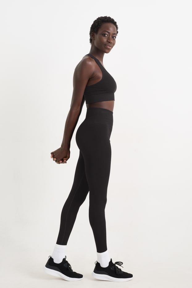 Femei - Colanți sport - protecție UV - negru
