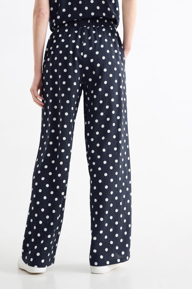 Femei - Pantaloni de stofă - talie înaltă - wide leg - cu buline - albastru închis