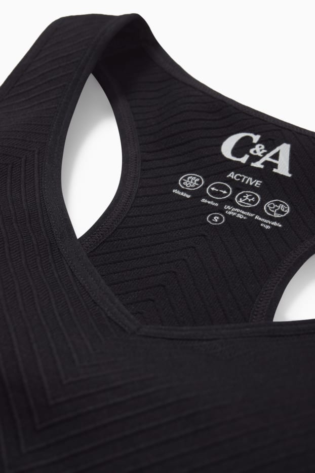 Women - Sports bra - padded - textured - UV protection - black