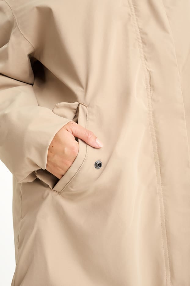Damen - Regenjacke mit Kapuze - wasserdicht - beige