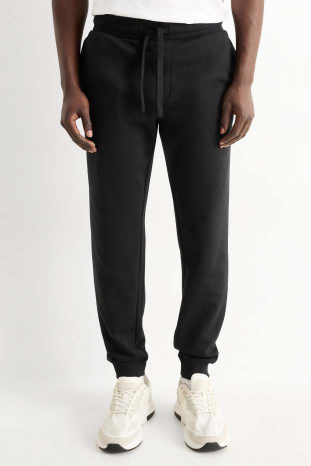 Bărbați - Pantaloni de trening - negru