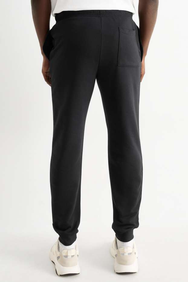 Bărbați - Pantaloni de trening - negru