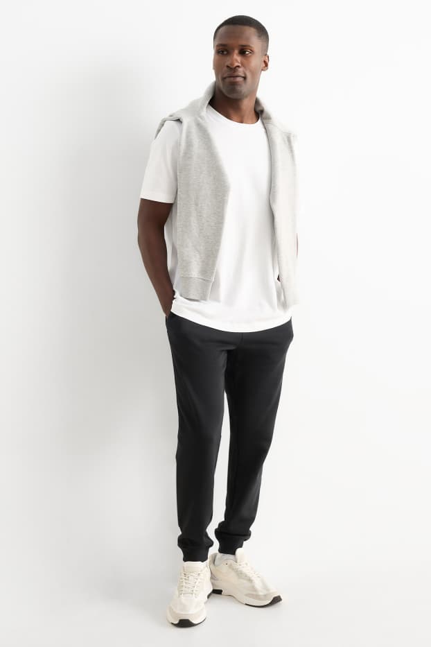 Bărbați - Pantaloni de trening - negru