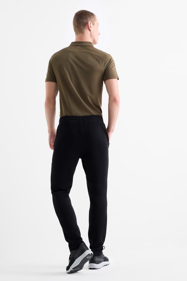 Bărbați - Pantaloni de trening funcționali - negru