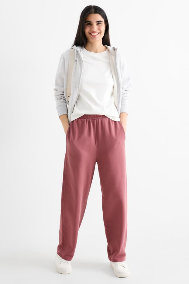 Dámské - Teplákové kalhoty - tmavě růžová