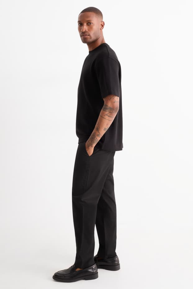 Bărbați - Chino - tapered fit - negru