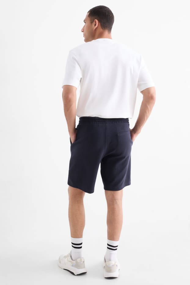 Bărbați - Pantaloni scurți de trening - structurați - albastru închis