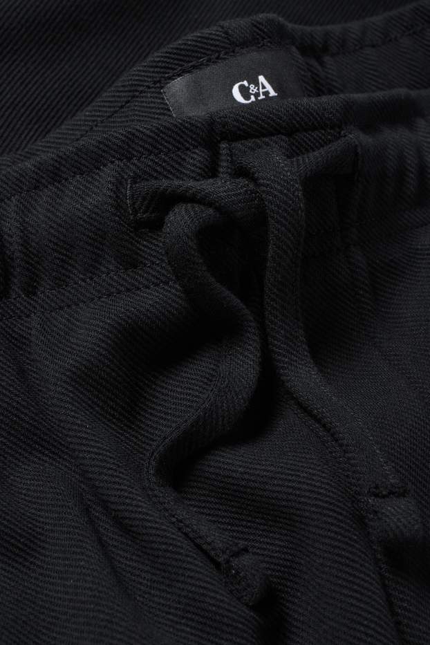 Bărbați - Pantaloni de trening - structurați - negru