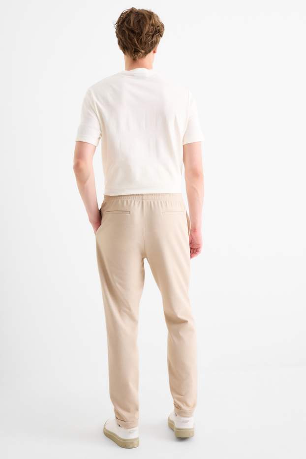 Bărbați - Pantaloni de trening - bej deschis