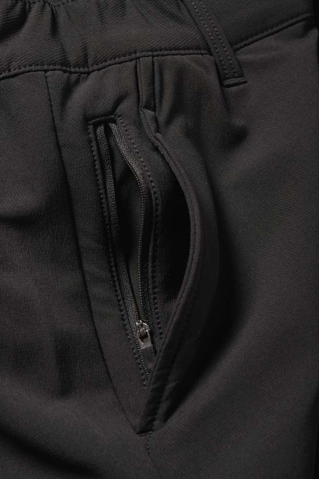 Bărbați - Pantaloni de trening funcționali - rezistenți la apă - negru