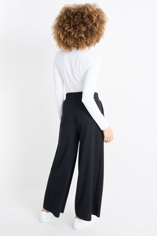 Femei - Pantaloni din jerseu - talie medie - palazzo - negru