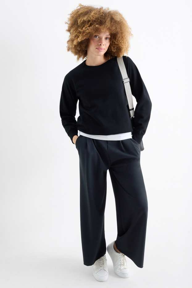 Femei - Pantaloni din jerseu - talie medie - palazzo - negru