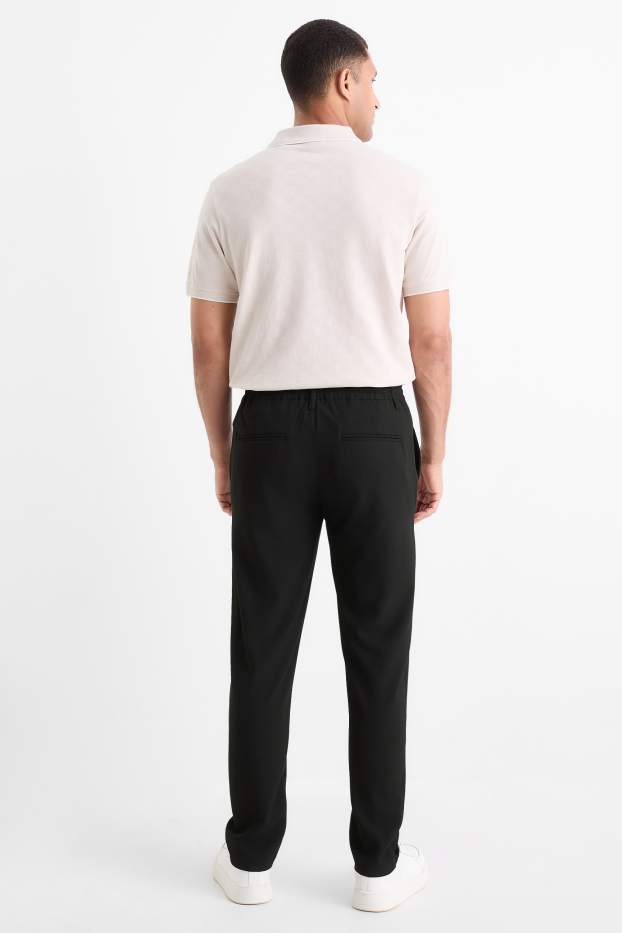 Men - Chinos - tapered fit - black