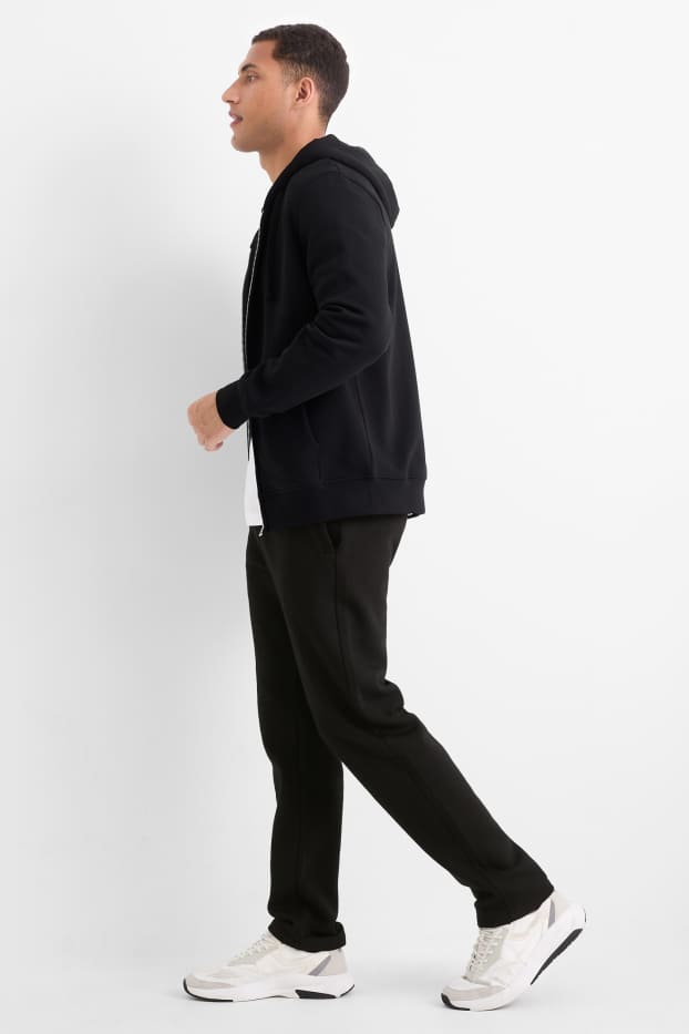 Bărbați - Pantaloni de trening - negru