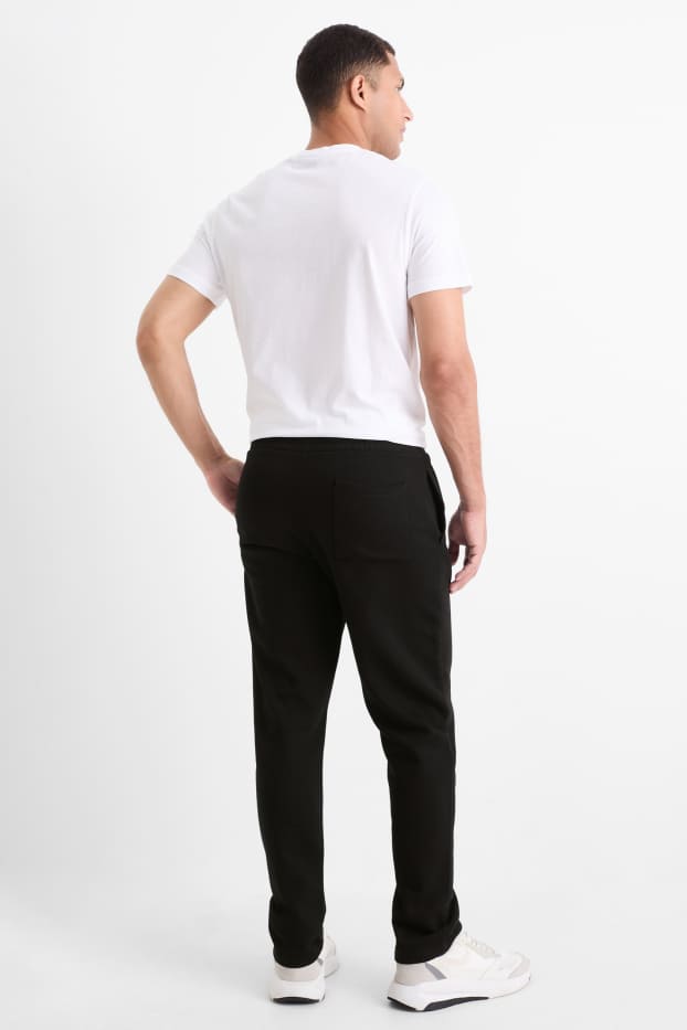Bărbați - Pantaloni de trening - negru